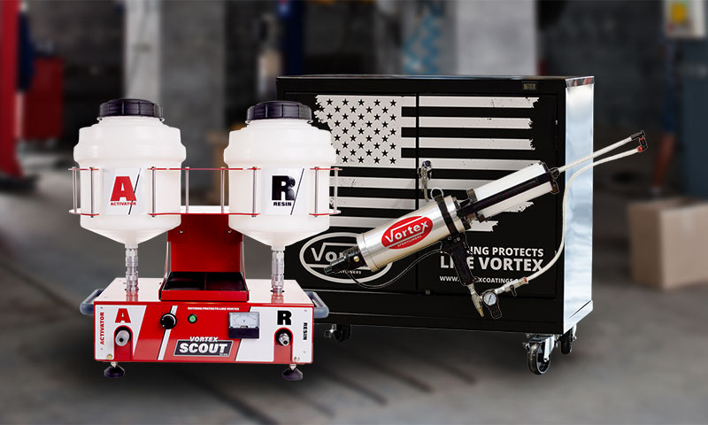 auto garage with vortex spraylining equipment on the floor